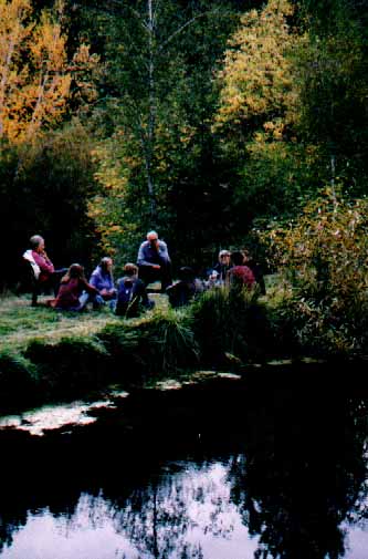 Pond-side discussion group.