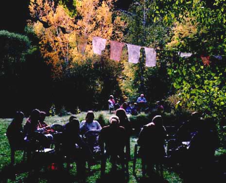 Workshop groups meet on lawn of historic Trillium farmhouse.